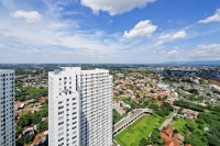 Apartemen Cisauk Point - Warm Wooden Touch Studio Room at Apartment Cisauk Point By Travelio