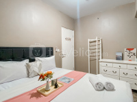 Comfy and Well Furnished 2BR Springlake Summarecon Bekasi Apartment By Travelio