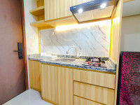 Apartemen Grand Dharmahusada Lagoon - Wood Accents Studio at Grand Dharmahusada Lagoon Apartment by Travelio