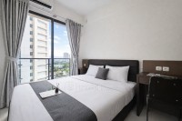 Studio with Simple Style at Sky House BSD Apartment By Travelio