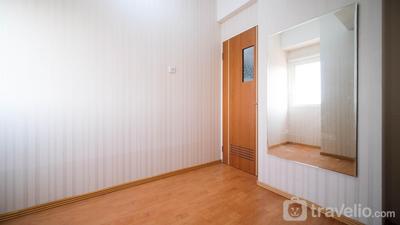 Apartemen Puncak Dharmahusada - Homey 2BR with Extra Room at Puncak Dharmahusada Apartment By Travelio