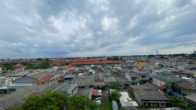 Apartemen East Park - Cozy Studio Unfurnished with AC at East Park Apartment By Travelio