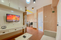 Pleasant and Modern Look 1BR Green Pramuka City Apartment By Travelio