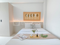 Homey and Tranquil 2BR Apartment Transpark Cibubur By Travelio