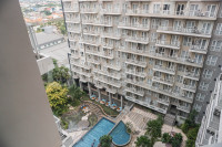 Apartemen Grande Valore Condominium - Wonderful and Pool View 1BR Apartment Grande Valore Condominium By Travelio