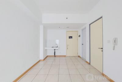 Cozy Unfurnished 2BR with AC at 27th Floor Apartment M-Town Residence By Travelio