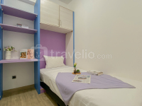 Spacious and Homey Combined 3BR Apartment Green Pramuka City By Travelio