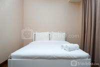 1BR near Mall at Puri Orchard Apartment By Travelio