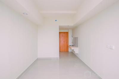 Apartemen Evenciio Margonda - Unfurnished Studio Room with AC at Evenciio Margonda Apartment By Travelio