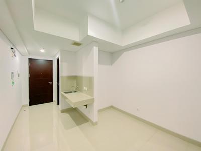 Cozy Studio Unfurnished with AC at Pesona Square Depok Apartment By Travelio