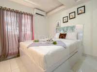 Studio near Rajawali Station at Amethyst Apartment By Travelio