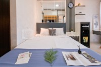 Monochrome Studio Apartment at Transpark Bintaro By Travelio