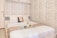 Cozy Living Studio above Mall with Pool View at Bassura city Apartment By Travelio