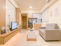 Restful and Homey 2BR Apartment Meikarta By Travelio