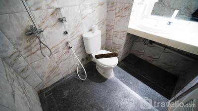 Apartemen Puncak Dharmahusada - Homey 2BR with Extra Room at Puncak Dharmahusada Apartment By Travelio