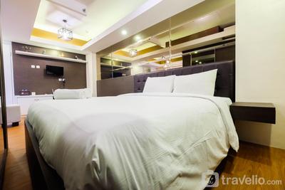 Spacious Studio Room at Green Pramuka City Apartment By Travelio
