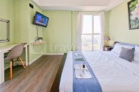 Green Touch Studio Apartment at Casa de Parco By Travelio