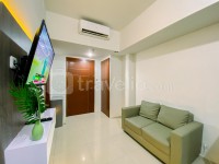 Spacious and Relaxing 2BR Apartment at Corner Vittoria Residence By Travelio