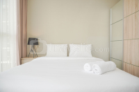 Homey and Warm 1BR at Ciputra International Apartment By Travelio
