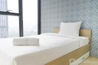 South Tower 2BR at L'Avenue Apartment By Travelio