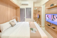 Warm and Well Designed Studio Room at Green Pramuka City Apartment By Travelio