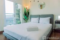 Homey and Nice 1BR Puri Orchard Apartment By Travelio