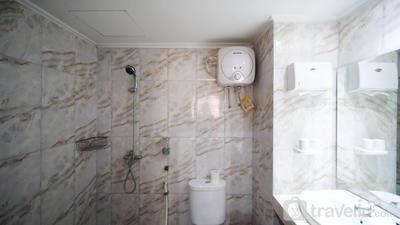 Apartemen Puncak Dharmahusada - Homey 2BR with Extra Room at Puncak Dharmahusada Apartment By Travelio