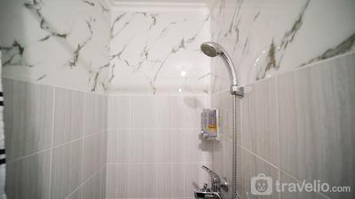 Apartemen Puncak Dharmahusada - Spacious 3BR Combined at Puncak Dharmahusada Apartment By Travelio