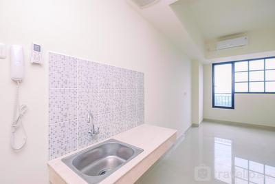 Apartemen Evenciio Margonda - Unfurnished Studio Room with AC at Evenciio Margonda Apartment By Travelio