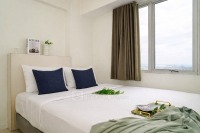 Neat and Nice 2BR at Apartment Bassura City By Travelio