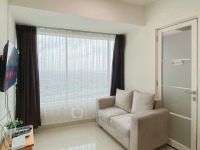Apartemen Grand Kamala Lagoon - Practical Semi Furnished 2BR at Grand Kamala Lagoon Apartment By Travelio