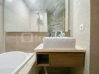 Apartemen Grande Valore Condominium - Homey and Minimalist Studio Apartment at Grande Valore Condominium By Travelio