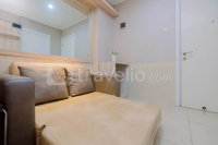 Compact Warm 2BR at Green Pramuka City Apartment By Travelio