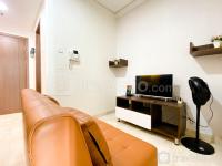 Gorgeous and Homey 1BR Puri Orchard Apartment By Travelio