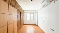 Apartemen East Park - Cozy Stay Unfurnished 2BR at East Park Apartment with AC By Travelio