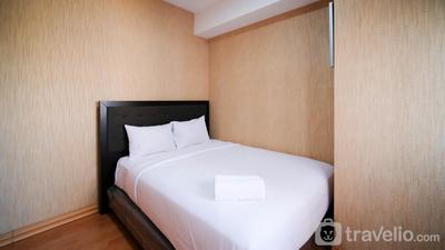 Apartemen Puncak Dharmahusada - Homey 2BR with Extra Room at Puncak Dharmahusada Apartment By Travelio