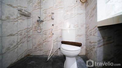 Apartemen Puncak Dharmahusada - Homey 2BR with Extra Room at Puncak Dharmahusada Apartment By Travelio