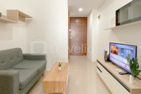 Warm and Simple 1BR Apartment  at Vittoria Residence By Travelio