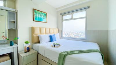 Spacious and Homey 3BR at Green Bay Pluit Apartment By Travelio