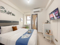 Compact and Homey Studio Apartment at Transpark Cibubur By Travelio