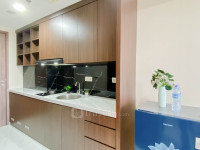 Apartemen Sakura Garden City - Dark Wood Touch Studio at Sakura Garden City Apartment By Travelio
