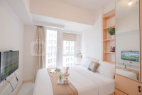 Peach Touch Studio Room at Tokyo Riverside PIK 2 Apartment By Travelio