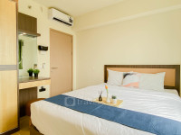 Wooden Accents 2BR for 3 Pax at Meikarta District 2 Apartment By Travelio