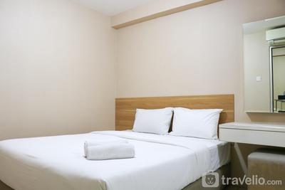 Cozy Living and Tidy 2BR Green Bay Pluit Apartment By Travelio