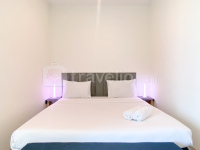 Simply Look Studio at Grand Kamala Lagoon Apartment By Travelio