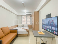 Affordable and Homey Studio Room at Meikarta Apartment By Travelio