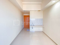 Unfurnished Studio with AC Apartment Evenciio Margonda By Travelio