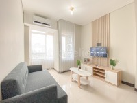 Brand New and Homey 2BR Apartment at Nifarro Park By Travelio