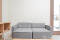 Fancy and Comfort Living 1BR at Puri Orchard Apartment By Travelio