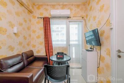 Comfort 2BR Apartment at Green Pramuka City By Travelio